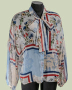 Blusa in Poliestere Riciclato con Fiocco e Stampa Floreale – Mimi-Muà