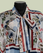 Blusa in Poliestere Riciclato con Fiocco e Stampa Floreale – Mimi-Muà