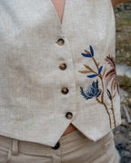 Coordinato in lino: gilet ricamato e pantaloni palazzo