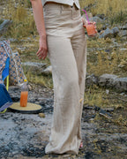 Coordinato in lino: gilet ricamato e pantaloni palazzo